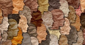 Artistic image of a face silhouette overlaid with different skin tones